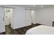 Bright bedroom with hardwood floors and updated closet space at 6519 Creekside Ln, Indianapolis, IN 46220