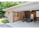 Open garage with exercise equipment and ample storage solutions, catering to an active lifestyle at 6519 Creekside Ln, Indianapolis, IN 46220