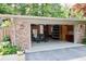 Open garage featuring a bike, workout equipment, and ample storage space for various needs at 6519 Creekside Ln, Indianapolis, IN 46220
