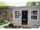 An outdoor storage room with shelving and windows, providing extra space for organizing belongings at 6519 Creekside Ln, Indianapolis, IN 46220