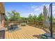 Inviting deck with an outdoor dining area, perfect for entertaining and enjoying the outdoors at 6529 Lakesedge Dr, Indianapolis, IN 46237