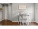 Dining room with modern decor, wood floors, and great natural lighting at 6529 Lakesedge Dr, Indianapolis, IN 46237