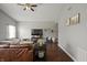 Spacious living room features hardwood floors and a comfortable seating area for relaxation and entertainment at 6529 Lakesedge Dr, Indianapolis, IN 46237