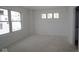 Spacious bedroom with natural light from three windows at 7071 Pate Hollow Dr, Brownsburg, IN 46112