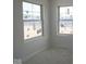Bright bedroom with two large windows providing plenty of natural light at 7071 Pate Hollow Dr, Brownsburg, IN 46112