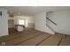 Spacious living room with an open floor plan and access to the backyard at 7071 Pate Hollow Dr, Brownsburg, IN 46112