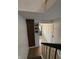 Welcoming entryway with unique wood wall decor, wainscoting, and modern lighting at 7492 Country Brook Dr, Indianapolis, IN 46260