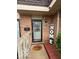 Charming brick home with a welcoming front entrance and 