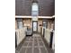 Charming front entrance with brick facade and welcoming walkway at 7492 Country Brook Dr, Indianapolis, IN 46260