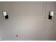 Wall with painted panels and sconce lighting at 7492 Country Brook Dr, Indianapolis, IN 46260