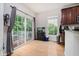 Dining Area with a sliding glass door leading to a balcony and a fish tank at 755 Ivy Ln, Carmel, IN 46032