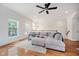 Spacious living room with hardwood floors, bright windows, and comfortable seating at 755 Ivy Ln, Carmel, IN 46032