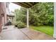 Outdoor patio area with a view of the lawn and landscaping at 755 Ivy Ln, Carmel, IN 46032