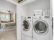 Laundry room with a view of the main bedroom at 8133 Lower Bay Ln, Indianapolis, IN 46236