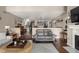 An open-concept living area, with stairs, bar, and dining area, perfect for entertaining and Gathering time at 8133 Lower Bay Ln, Indianapolis, IN 46236
