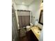 Modern bathroom with a shower-tub combination and a granite vanity at 8176 Crumwell Dr, Avon, IN 46123