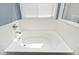 Bright bathroom showcasing a pristine white tub with tiled walls and modern fixtures at 8176 Crumwell Dr, Avon, IN 46123