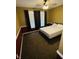 Well-lit bedroom with ample sunlight, cozy carpet, and dark-colored curtains at 8176 Crumwell Dr, Avon, IN 46123