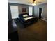 Spacious bedroom with a ceiling fan, two large windows, and cozy carpet at 8176 Crumwell Dr, Avon, IN 46123