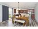 The combination dining/kitchen area has laminate floors, modern appliances and ample room to entertain at 8176 Crumwell Dr, Avon, IN 46123