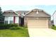 Charming single-story home featuring brick and siding accents, complemented by a well-maintained lawn at 8176 Crumwell Dr, Avon, IN 46123