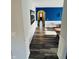 Hallway with wood floors and stylish decor leading to a bright, inviting space at 8176 Crumwell Dr, Avon, IN 46123