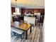 Open kitchen and dining area with stainless steel appliances and modern light fixtures at 8176 Crumwell Dr, Avon, IN 46123
