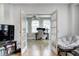 Bright home office featuring hardwood floors, ample natural light, and comfortable seating at 8436 E 56Th St, Indianapolis, IN 46216