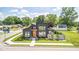 Modern home featuring sleek architectural design, lush landscaping, and a welcoming entrance, complemented by mature trees at 8695 Morgan Dr, Fishers, IN 46038
