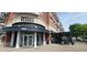 Inviting restaurant exterior with a modern facade, spacious covered patio, and convenient entrance at 8695 Morgan Dr, Fishers, IN 46038