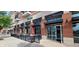 Restaurant exterior with covered patio seating and a brick facade with large windows at 8695 Morgan Dr, Fishers, IN 46038