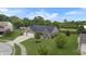 Charming brick home with a well-manicured lawn, two-car garage and concrete driveway, offering great curb appeal at 930 Penstock Ct, Avon, IN 46123