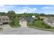 Aerial view of single Gathering home featuring two car garage and manicured lawn at 930 Penstock Ct, Avon, IN 46123
