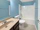 Full bathroom with a tub and shower combination, modern fixtures, and vanity with countertop basin at 930 Penstock Ct, Avon, IN 46123