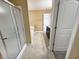 Bathroom featuring a tile shower, soaking tub, and double sink vanity at 930 Penstock Ct, Avon, IN 46123