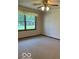 Bedroom with neutral carpet, natural light and a ceiling fan at 9451 S Amanda Dr, Claypool, IN 46510