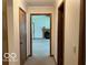 Hallway with doorways leading to the various rooms of the house at 9451 S Amanda Dr, Claypool, IN 46510