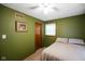 Bedroom with two windows and a ceiling fan at 955 Wood Creek Pl, Greenwood, IN 46142