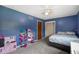 Bedroom featuring a bed, dollhouse and closet at 955 Wood Creek Pl, Greenwood, IN 46142