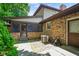 Back exterior of home featuring screened in porch and brick at 955 Wood Creek Pl, Greenwood, IN 46142