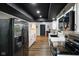 Modern kitchen with stainless steel refrigerator and white countertops at 955 Wood Creek Pl, Greenwood, IN 46142