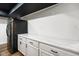 Kitchenette featuring white countertop and cabinets with black appliances at 955 Wood Creek Pl, Greenwood, IN 46142