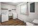 Laundry room featuring a washer, dryer, and sink at 955 Wood Creek Pl, Greenwood, IN 46142