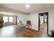 Large living area with wood floors and plenty of natural light at 955 Wood Creek Pl, Greenwood, IN 46142