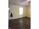 Sunny room boasts durable vinyl flooring and a bright, inviting atmosphere at 10129 Peartree Rd, Indianapolis, IN 46235