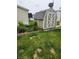 The backyard features a sturdy shed with white trim and a well-maintained lawn at 10129 Peartree Rd, Indianapolis, IN 46235