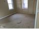 Bedroom with large built in storage cabinets and a window view at 1018 Jefferson Ave, Indianapolis, IN 46201