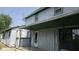 Home exterior featuring a covered porch and side entrance at 1018 Jefferson Ave, Indianapolis, IN 46201