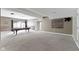 Finished basement with a pool table and decorative wood accent wall at 1051 Arrowwood Dr, Carmel, IN 46033