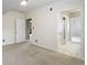 Neutral bedroom with a walk-in closet and attached bathroom at 1051 Arrowwood Dr, Carmel, IN 46033